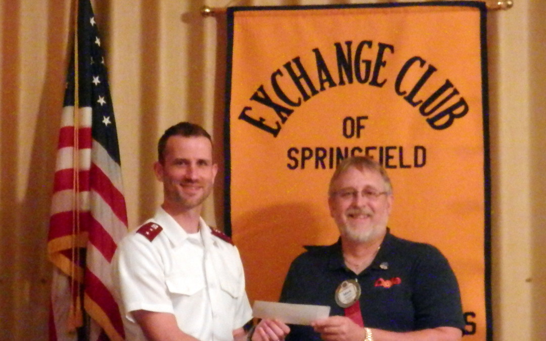 Springfield Exchange present $1,000 donation to local Salvation Army unit.